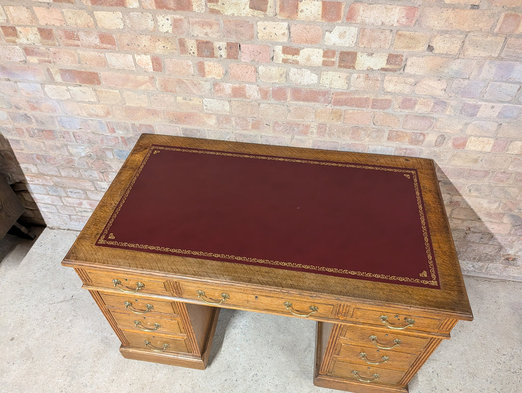Early 20th Century Maple & Co Antique Oak Leather Top Writing Desk - 9 Drawer