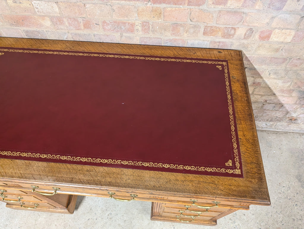 Early 20th Century Maple & Co Antique Oak Leather Top Writing Desk - 9 Drawer