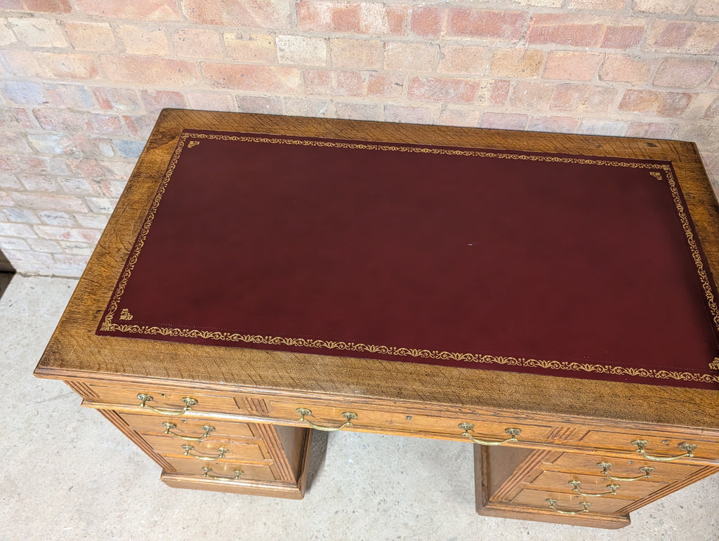 Early 20th Century Maple & Co Antique Oak Leather Top Writing Desk - 9 Drawer