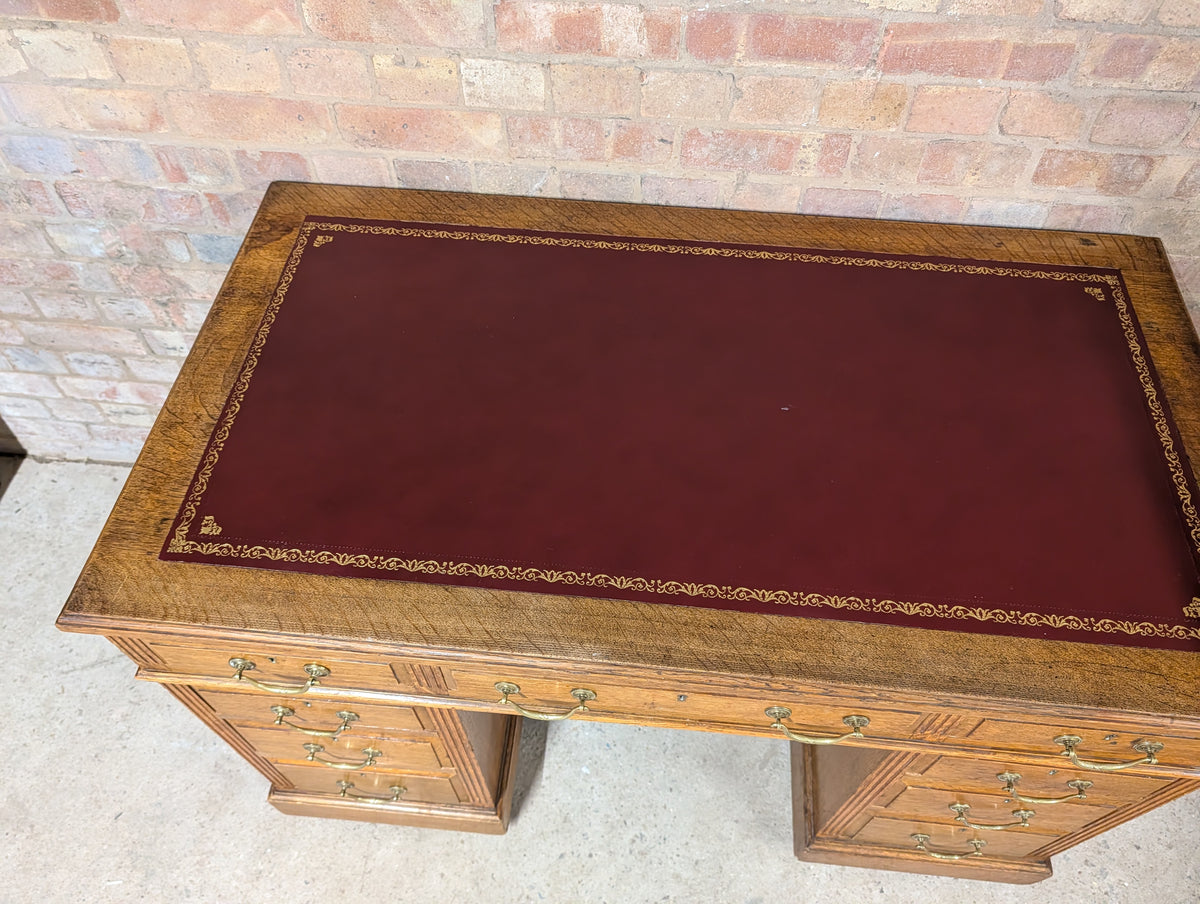 Early 20th Century Maple & Co Antique Oak Leather Top Writing Desk - 9 Drawer