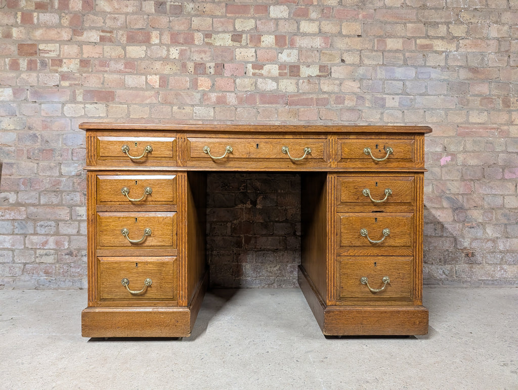 Early 20th Century Maple & Co Antique Oak Leather Top Writing Desk - 9 Drawer