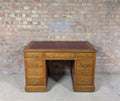 Early 20th Century Maple & Co Antique Oak Leather Top Writing Desk - 9 Drawer