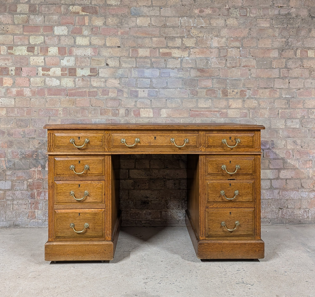 Early 20th Century Maple & Co Antique Oak Leather Top Writing Desk - 9 Drawer