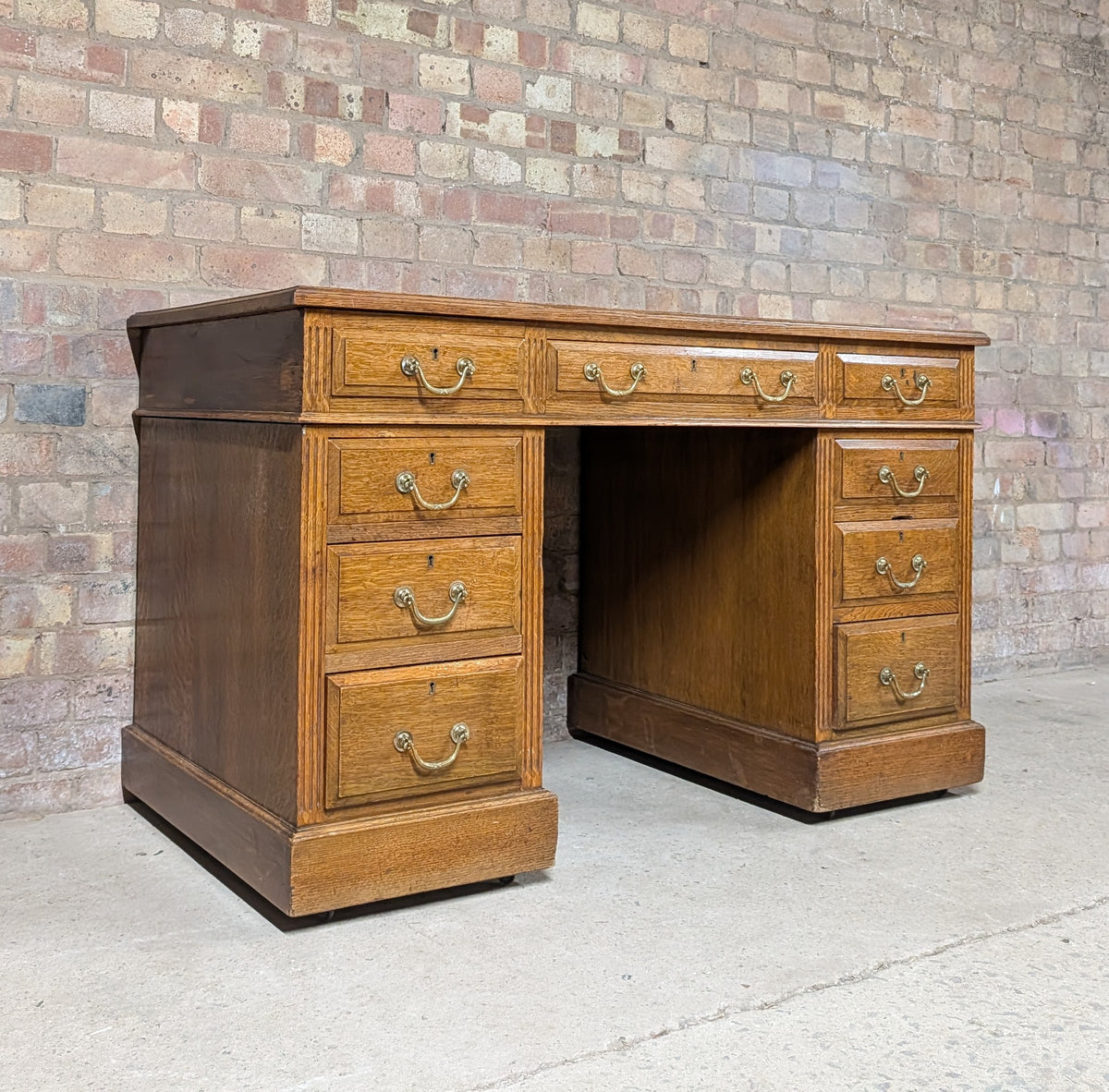 Early 20th Century Maple & Co Antique Oak Leather Top Writing Desk - 9 Drawer