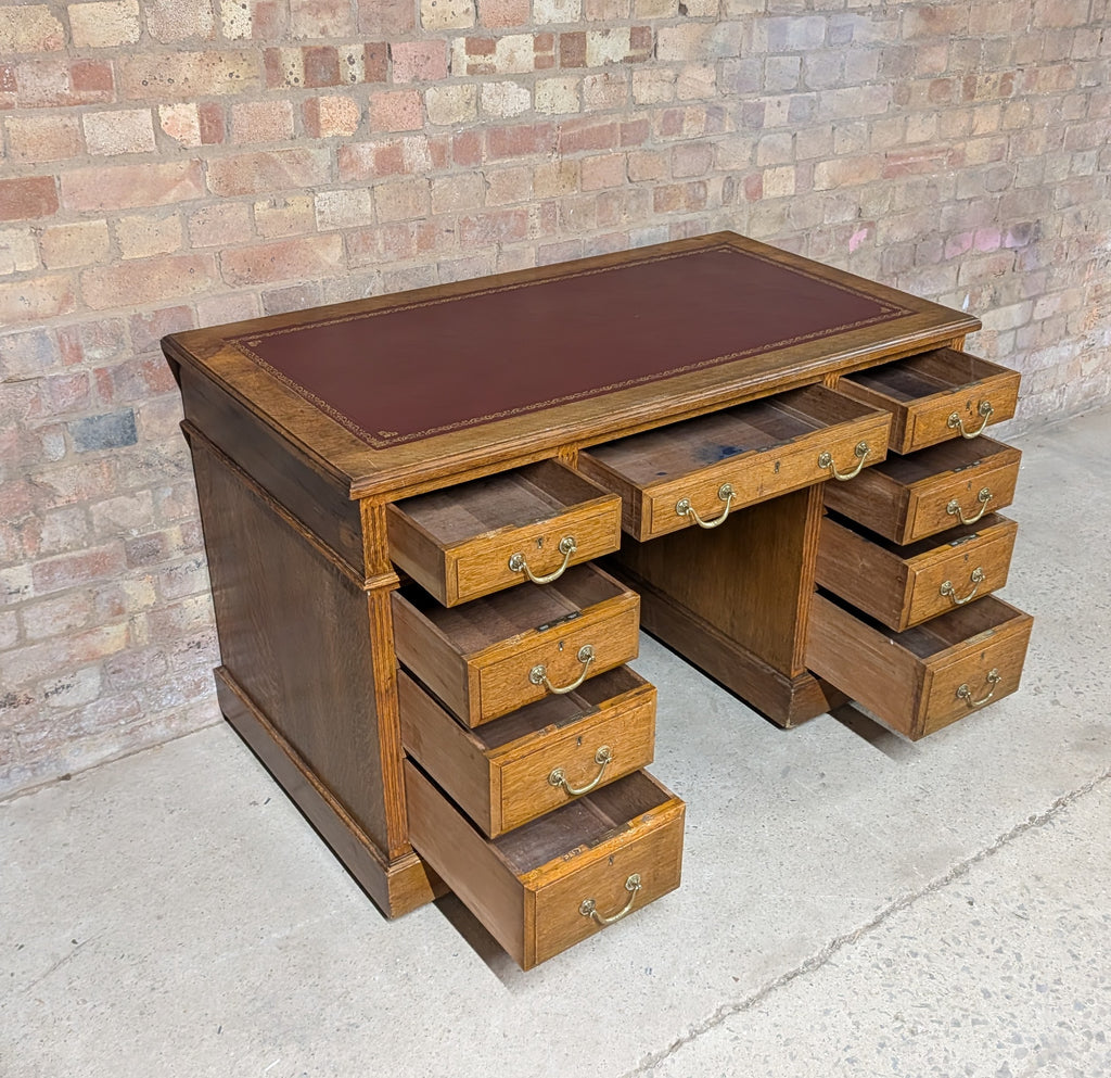 Early 20th Century Maple & Co Antique Oak Leather Top Writing Desk - 9 Drawer