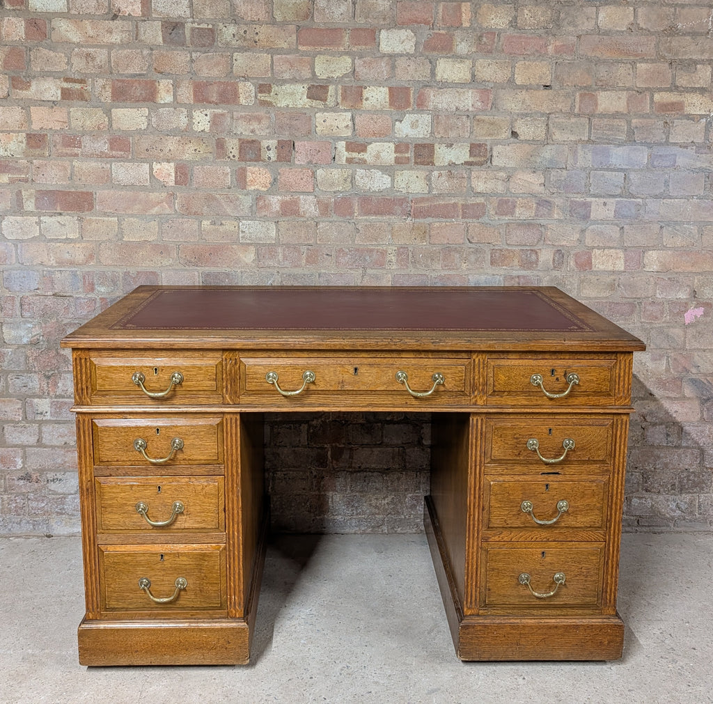 Early 20th Century Maple & Co Antique Oak Leather Top Writing Desk - 9 Drawer